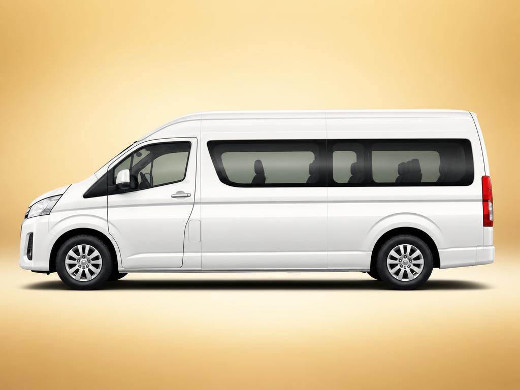 White PMI Toyota Hiace passenger van, side profile